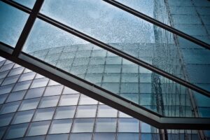 Looking up at a Houston commercial glass canopy