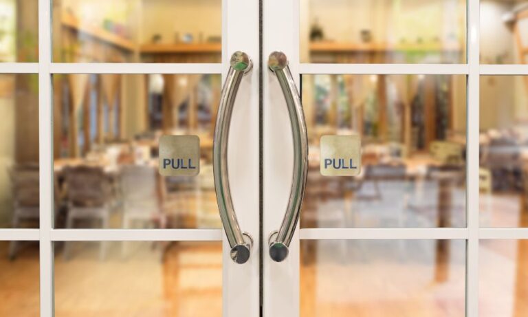 sparkling Houston commercial glass doors looking inside